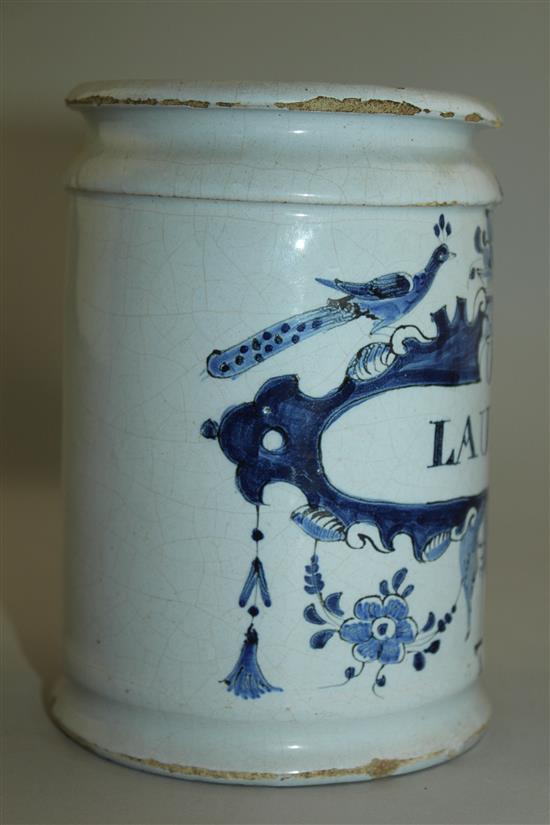 A Delft blue and white cylindrical wet drug jar, early 18th century, 15.5cm, some damage